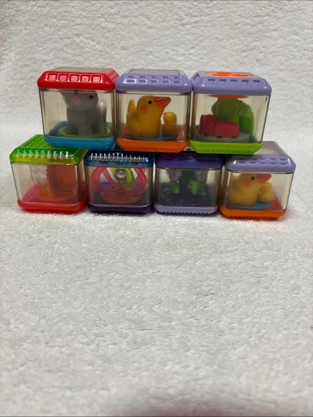 Fisher price Stackable manipulative Surprise Blocks spin to move
